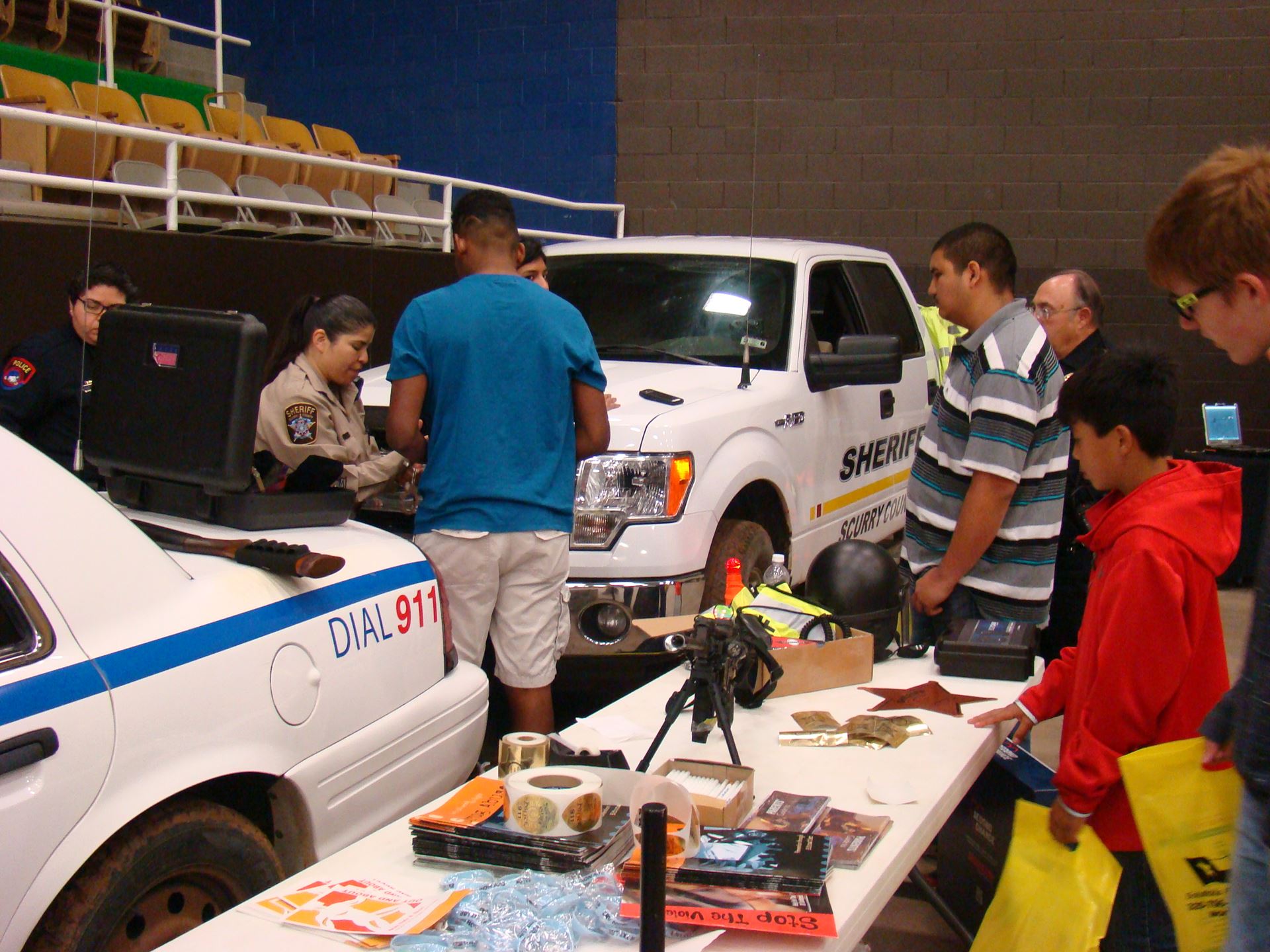 Students explore police and sheriff vehicles/equipment.